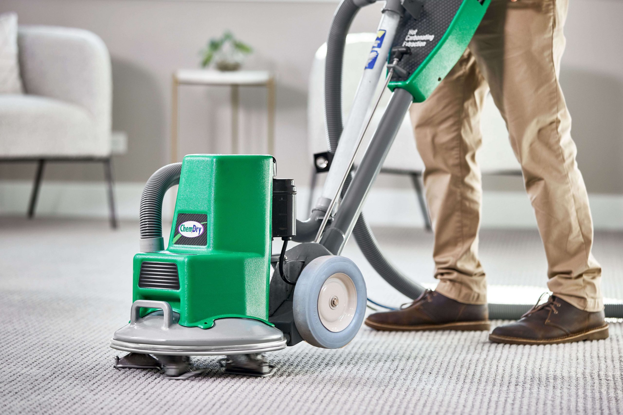 tech performing carpet cleaning