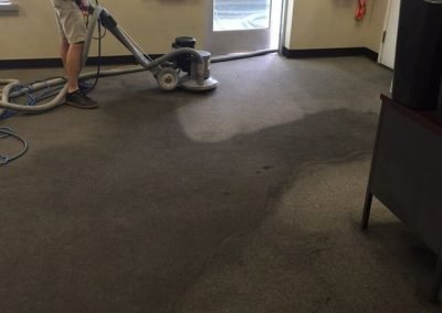 chem-dry tech performing commercial carpet cleaning in salt lake city business